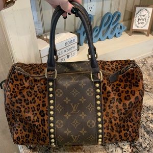 Upcycled LV leopard purse